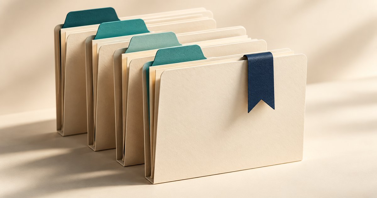 Organized paper folders with teal index tabs and a navy marker for the current document.
