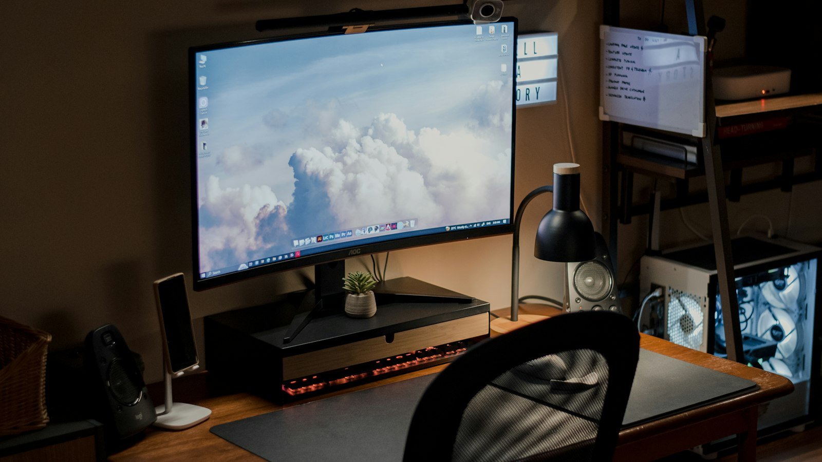 Developer desk with two monitors and a keyboard